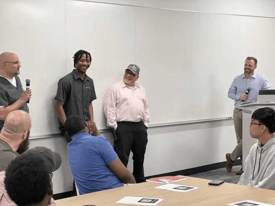 Chris Smith presenting to a group during a session